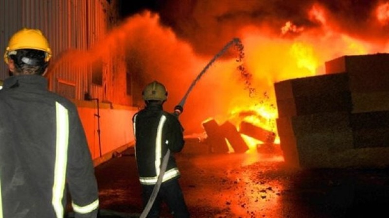 إنقاذ 7 محتجزين في حريق برج سكني ببورسعيد ....  تفاصيل